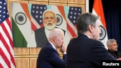صر بائیڈن،اور امریکہ اور بھارت کے وزرائے خارجہ کی ، نریندر مودی کے ساتھ ویڈیو کانفرنس۔فوٹو رائٹرز
